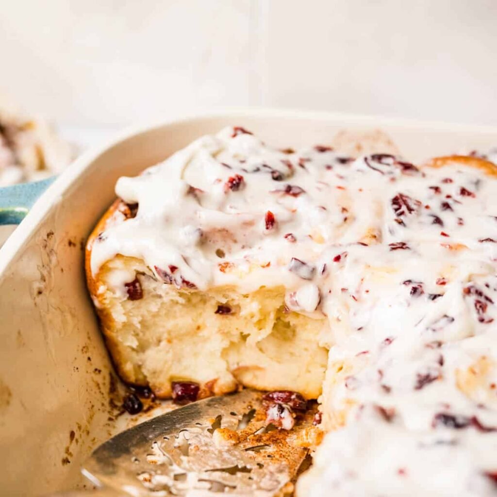 White chocolate cranberry cinnamon rolls with cream cheese icing