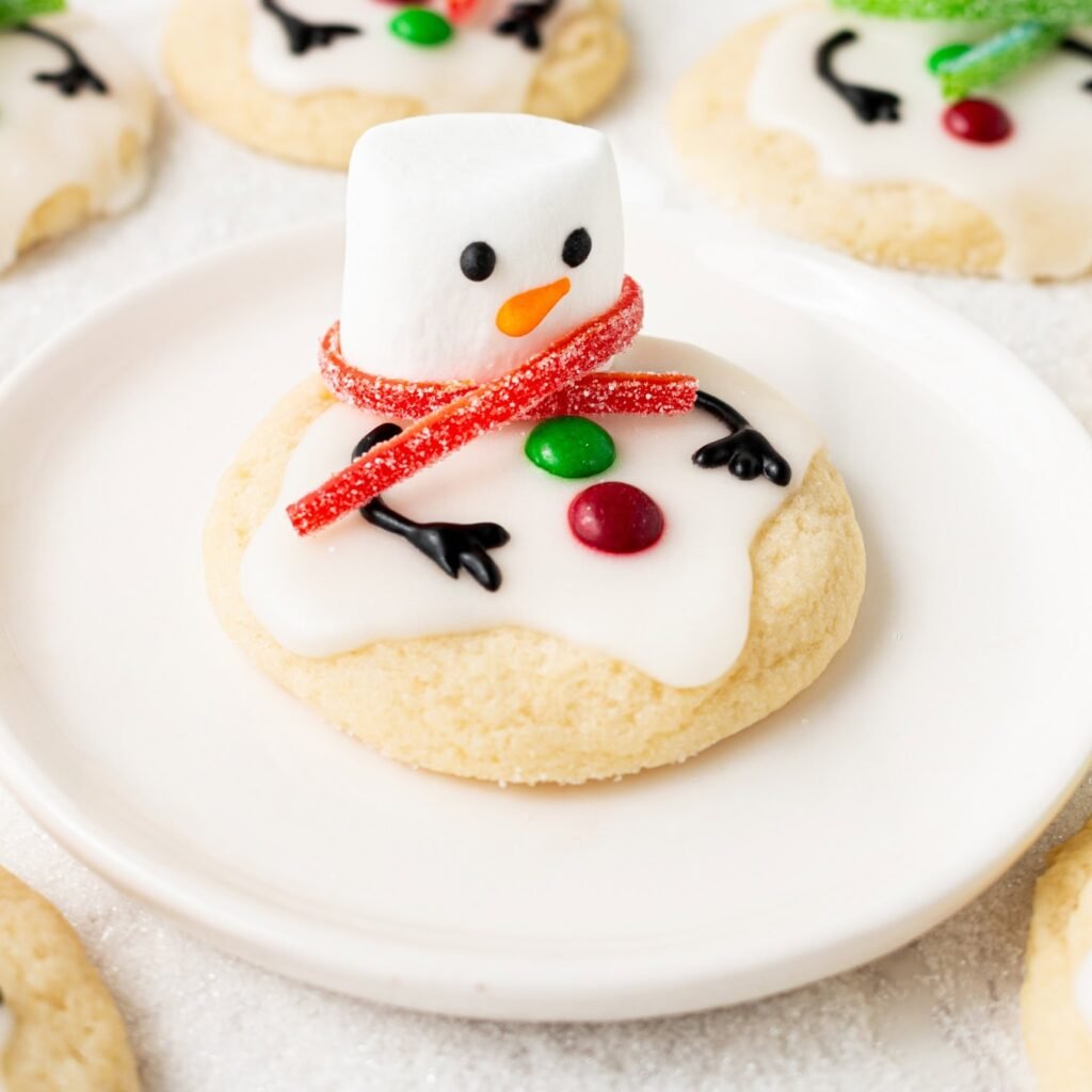 Melted snowman cookies with marshmallow heads