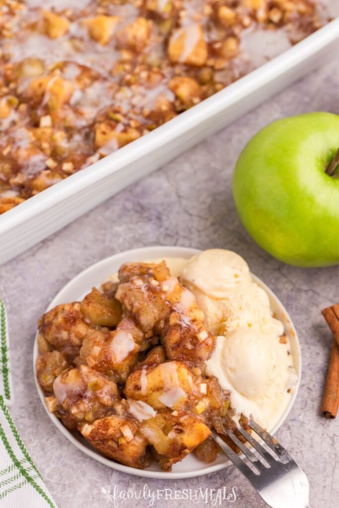 Apple pie bubble up bake with cinnamon roll pieces