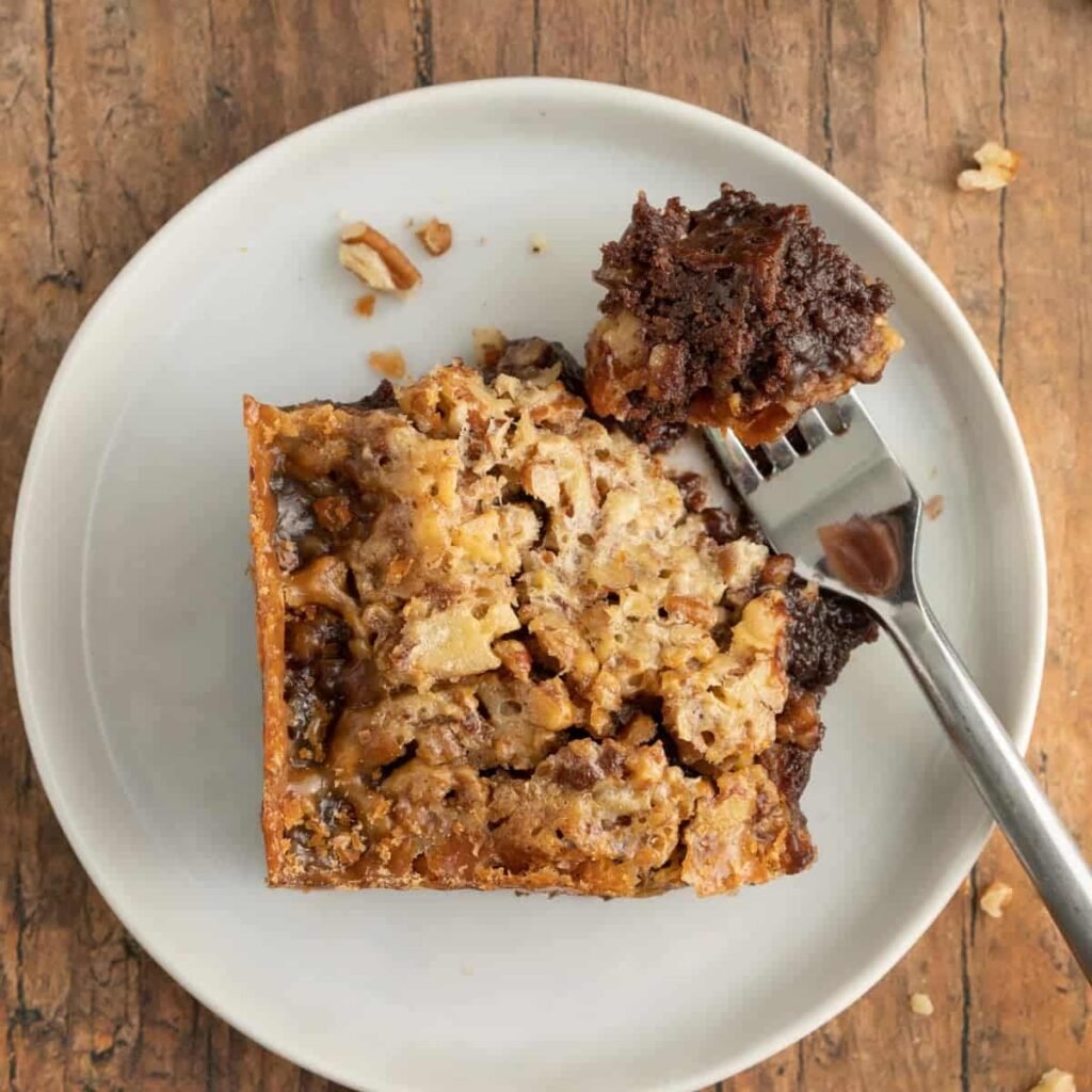 Pecan pie brownies with a gooey pecan layer