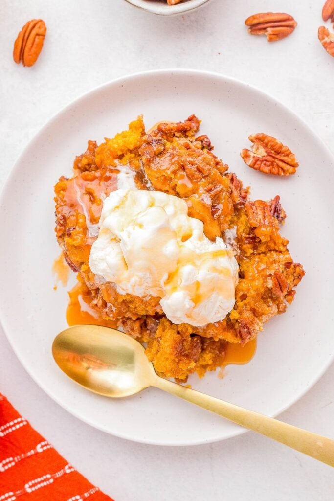 Pumpkin pecan cobbler with caramel sauce