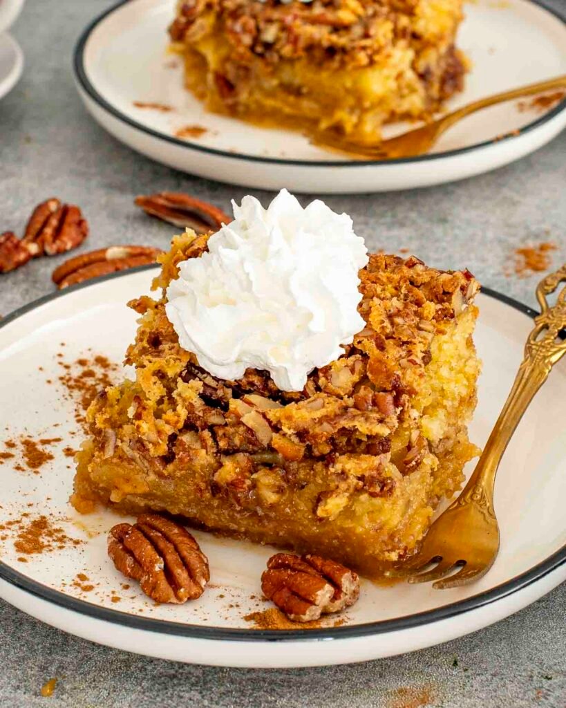 Pumpkin pecan gooey cake squares with a crunchy pecan topping