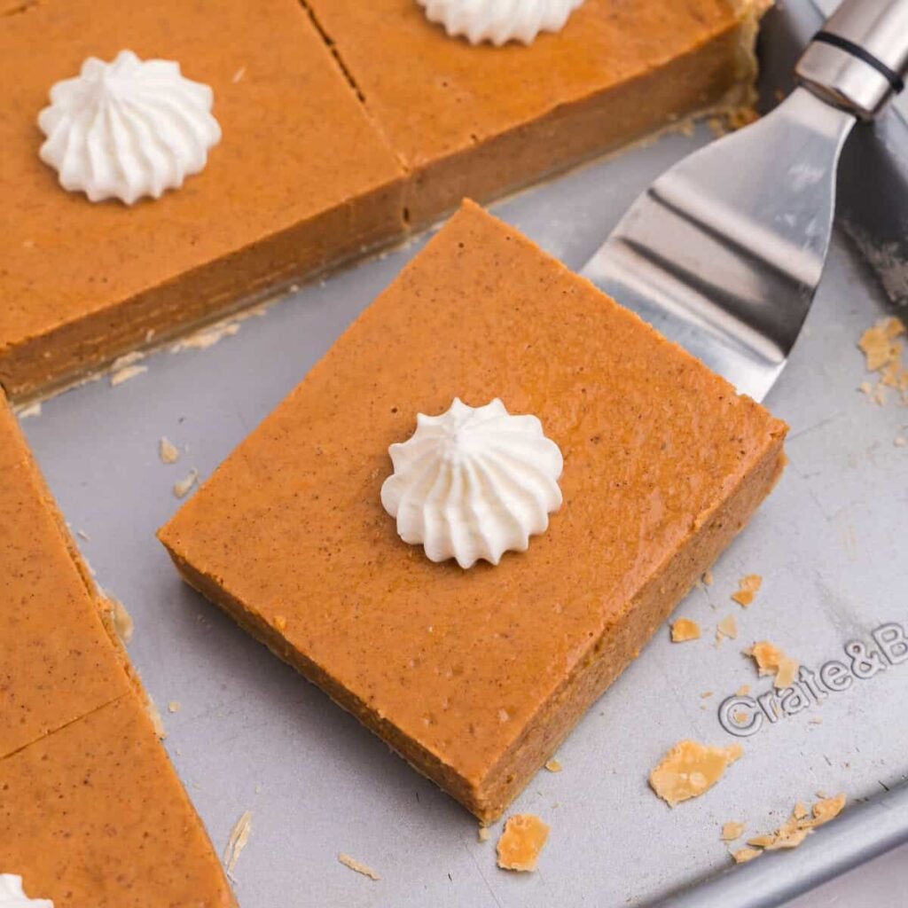Sheet pan pumpkin pie cut into squares