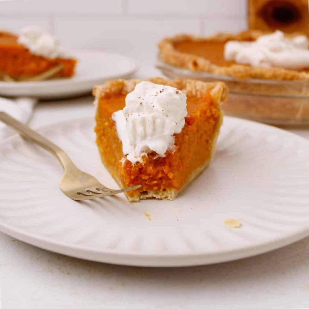 Southern sweet potato pie with whipped cream