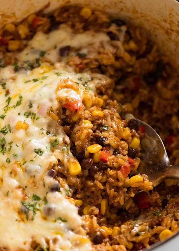 Mexican ground beef and rice casserole with melted cheese
