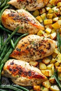 Sheet pan garlic herb butter chicken with potatoes and green beans