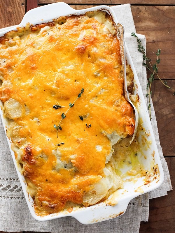 Cheesy scalloped potatoes baked until golden