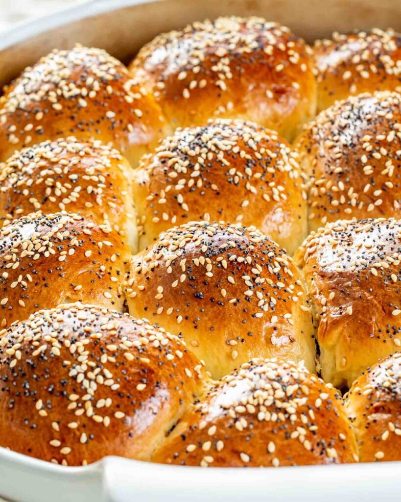 Soft classic dinner rolls in a baking dish