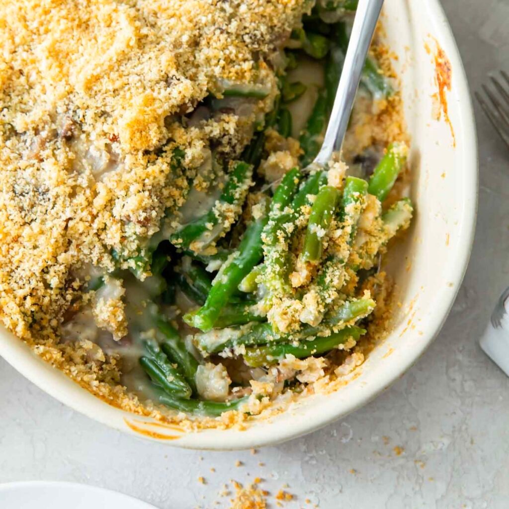 Green bean casserole from scratch with a crispy breadcrumb topping